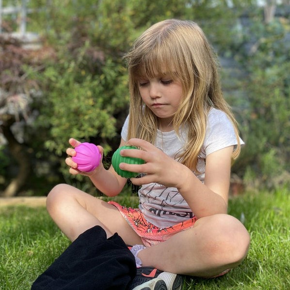 Kind met ballen