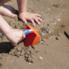 Op het strand met de kinderschep
